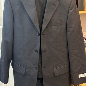 Elegant Versini Charcoal Suit for Men. Never worn